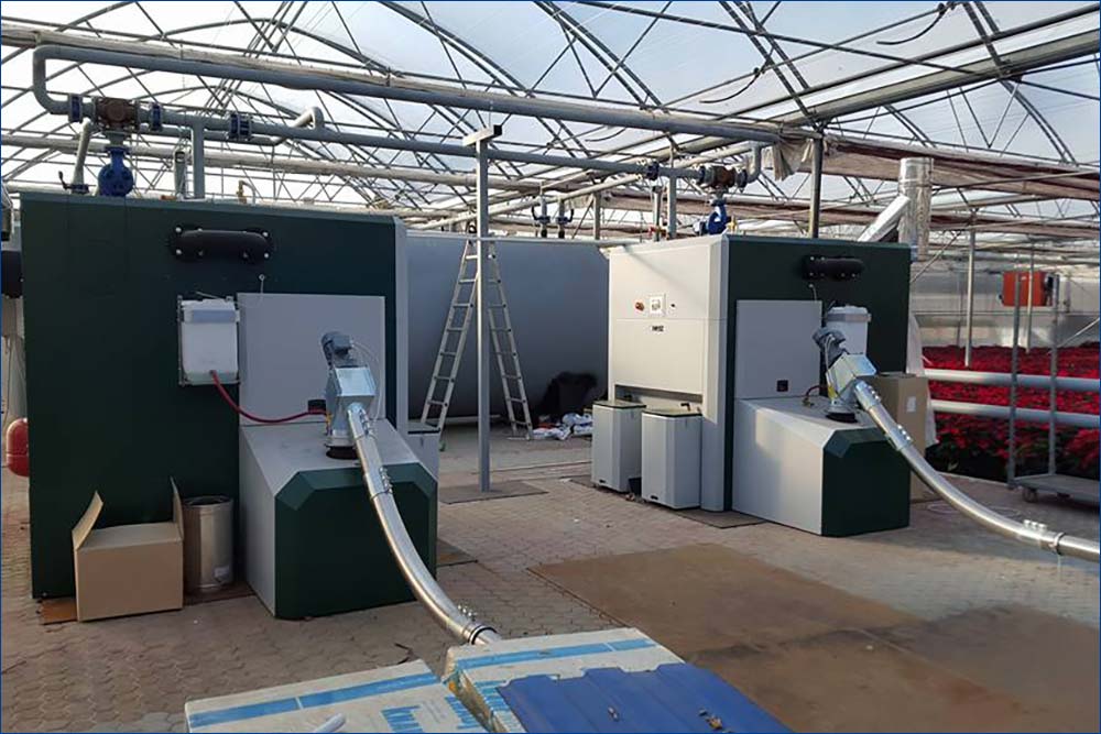 Realizzazioni: Impianto di riscaldamento con nr 2 caldaie a pellets da kw 500 in parallelo - Serre Maffucci Viareggio (LU)